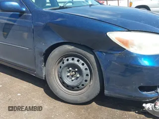 2003 Toyota Camry LE with VIN 4T1BE30K63U228722, listed as a IAAI auction lot 42205293 with 133,806 mi miles and . Bid and sale history available at DreamBid. Image 6.