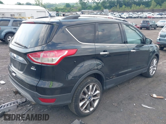2014 Ford Escape SE with VIN 1FMCU9G94EUD84466, listed as a IAAI auction lot 42645080 with 135,535 mi miles and . Bid and sale history available at DreamBid. Image 4.