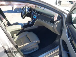 2013 Cadillac XTS Premium z VIN 2G61S5S35D9209252, wystawiony jako IAAI lot #41275066 z przebiegiem 132 311 mil mil oraz . Historia ofert i sprzedaży dostępna na DreamBid. Obrazek 5.