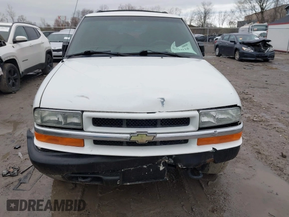 2003 Chevrolet Blazer LS z VIN 1GNDT13X63K106315, wystawiony jako IAAI lot #41914116 z przebiegiem 196 774 mil mil oraz . Historia ofert i sprzedaży dostępna na DreamBid. Obrazek 12.