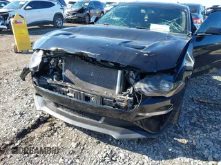 2019 Ford Mustang EcoBoost with VIN 1FA6P8TH8K5173458, listed as a IAAI auction lot 41085251 with 99,260 mi miles and . Bid and sale history available at carsss.com. Image 6.