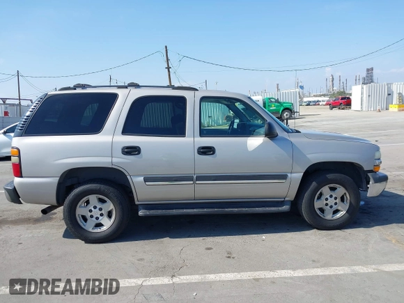 2004 Chevrolet Tahoe LS with VIN 1GNEC13T44R208111, listed as a IAAI auction lot 42189452 with 207,736 mi miles and . Bid and sale history available at DreamBid. Image 13.