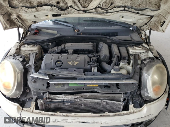2010 MINI Convertible with VIN WMWMR3C59ATU98597, listed as a Copart auction lot 53336025 with 88,273 mi miles and Salvage Title. Bid and sale history available at DreamBid. Image 11.