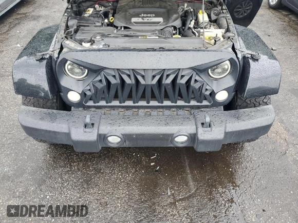 2015 Jeep Wrangler Unlimited Sahara with VIN 1C4BJWEG6FL643460, listed as a Copart auction lot 58557765 with 130,181 mi miles and Salvage title. Bid and sale history available at DreamBid. Image 11.
