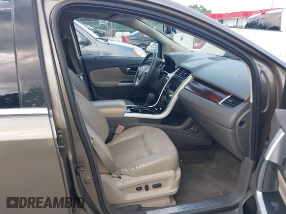 2013 Ford Edge Limited z VIN 2FMDK3KC3DBB01201, wystawiony jako IAAI lot #42648211 z przebiegiem 121 878 mil mil oraz . Historia ofert i sprzedaży dostępna na DreamBid. Obrazek 5.