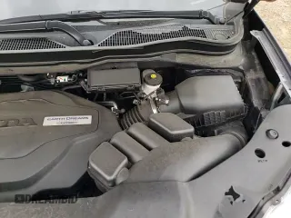 2019 Honda Pilot Touring 7-Passenger z VIN 5FNYF6H61KB007069, wystawiony jako Copart lot #66939925 z przebiegiem 98 569 mil mil oraz Szkoda całkowita • Salvage title. Historia ofert i sprzedaży dostępna na DreamBid. Obrazek 16.