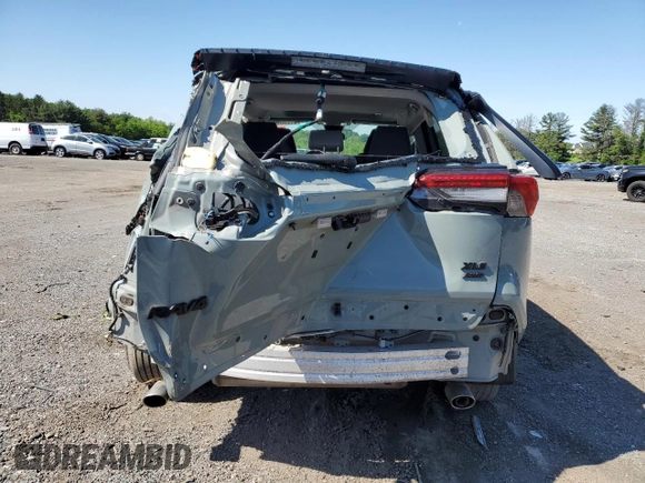 2022 Toyota RAV4 XLE with VIN 2T3P1RFV1NW259179, listed as a Copart auction lot 57253525 with 55,764 mi miles and Salvage title. Bid and sale history available at DreamBid. Image 6.