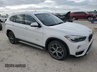 2017 BMW X1 sDrive28i with VIN WBXHU7C37H5H34418, listed as a Copart auction lot 53073995 with 67,980 mi miles and Salvage Title. Bid and sale history available at carsss.com. Image 4.
