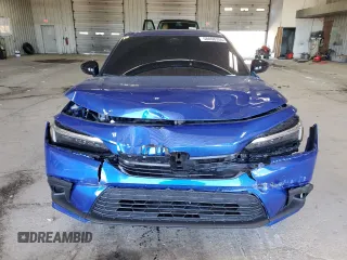 2023 Honda Civic Sport with VIN 2HGFE2F56PH562387, listed as a Copart auction lot 58408355 with 27,060 mi miles and Salvage title. Bid and sale history available at DreamBid. Image 5.