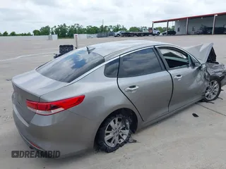 2018 Kia Optima LX with VIN 5XXGT4L38JG237631, listed as a IAAI auction lot 42286779 with 156,471 mi miles and . Bid and sale history available at DreamBid. Image 4.