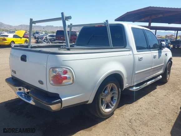 2001 Ford F-150 SuperCrew XLT with VIN 1FTRW07L51KC49955, listed as a IAAI auction lot 42035123 with 396,961 mi miles. Bid and sale history available at carsss.com. Image 4.