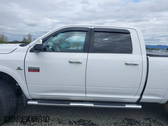2012 Ram 2500 Big Horn with VIN 3C6UD5DL8CG119834, listed as a IAAI auction lot 39124274 with 197,596 mi miles. Bid and sale history available at carsss.com. Image 15.