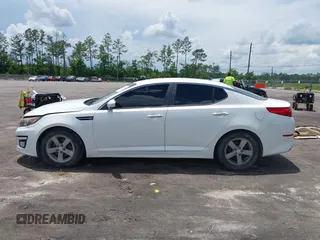 2015 Kia Optima LX with VIN KNAGM4A76F5639319, listed as a IAAI auction lot 42552130 with 207,006 mi miles and . Bid and sale history available at DreamBid. Image 14.