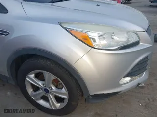 2015 Ford Escape SE with VIN 1FMCU0GXXFUC74744, listed as a IAAI auction lot 42046692 with 115,167 mi miles. Bid and sale history available at carsss.com. Image 6.