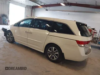 2015 Honda Odyssey Touring Elite with VIN 5FNRL5H97FB060060, listed as a IAAI auction lot 41829864 with Not Provided miles and . Bid and sale history available at DreamBid. Image 3.