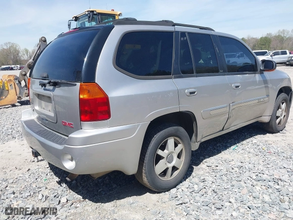 2005 GMC Envoy SLE with VIN 1GKDS13S652390259, listed as a IAAI auction lot 41825258 with 162,172 mi miles. Bid and sale history available at carsss.com. Image 4.