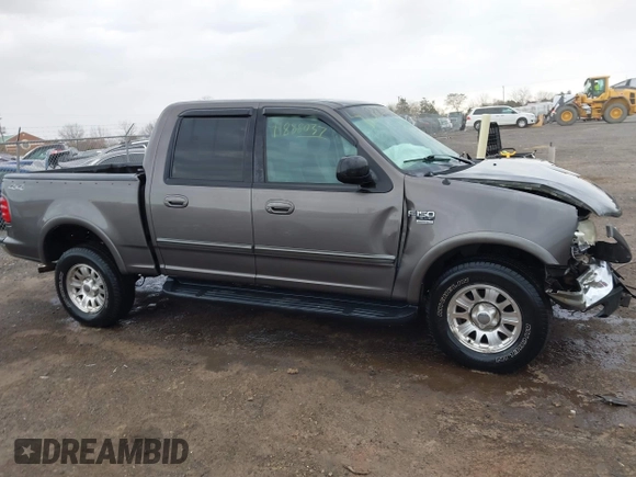 2003 Ford F-150 XLT with VIN 1FTRW086X3KA54557, listed as a IAAI auction lot 41888037 with 217,512 mi miles. Bid and sale history available at carsss.com. Image 13.