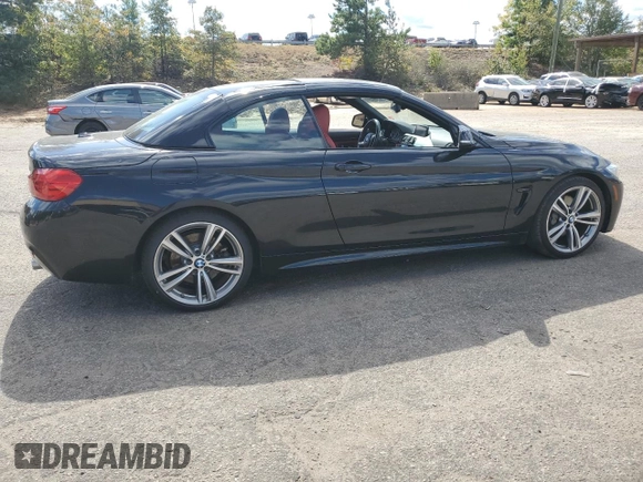 2014 BMW 4 Series 435i with VIN WBA3T3C59EP736749, listed as a Copart auction lot 76011404 with 48,815 mi miles and Salvage title. Bid and sale history available at DreamBid. Image 3.