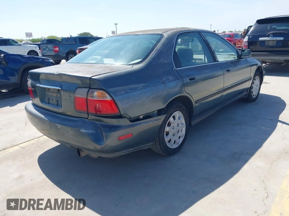 1996 Honda Accord LX with VIN 1HGCD5633TA286104, listed as a IAAI auction lot 42004112 with 186,586 mi miles and . Bid and sale history available at carsss.com. Image 4.