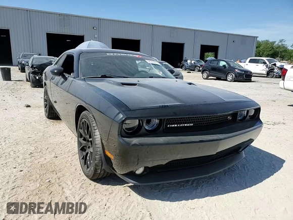 2014 Dodge Challenger R/T z VIN 2C3CDYBT6EH112199, wystawiony jako Copart lot #58023535 z przebiegiem 99 977 mil mil oraz Szkody całkowita. Historia ofert i sprzedaży dostępna na DreamBid. Obrazek 13.
