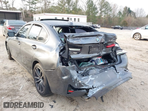 2019 BMW 3 Series 330i xDrive with VIN WBA5R7C53KAJ84615, listed as a IAAI auction lot 41774006 with Not provided miles and . Bid and sale history available at DreamBid. Image 6.