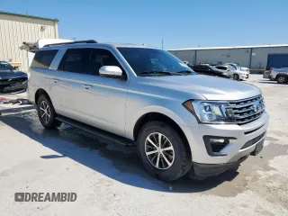 2019 Ford Expedition Max XLT with VIN 1FMJK1JT8KEA37151, listed as a Copart auction lot 50173895 with 142,360 mi miles and Salvage Title. Bid and sale history available at DreamBid. Image 4.