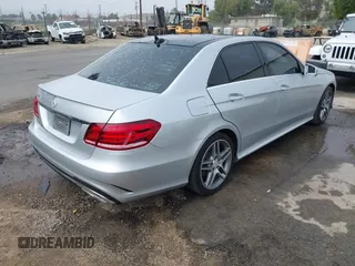2014 Mercedes-Benz E with VIN WDDHF5KB8EB009303, listed as a IAAI auction lot 42014846 with 97,214 mi miles. Bid and sale history available at carsss.com. Image 4.
