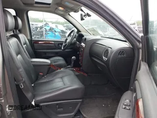 2008 GMC Envoy SLE2 with VIN 1GKDT13S482244279, listed as a IAAI auction lot 42144735 with 221,682 mi miles. Bid and sale history available at carsss.com. Image 5.