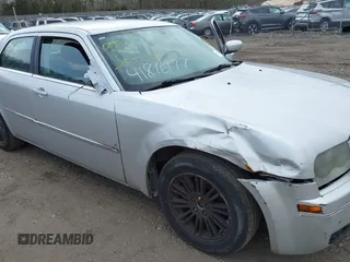 2009 Chrysler 300 Touring with VIN 2C3KA53V69H500462, listed as a IAAI auction lot 41896177 with 213,761 mi miles. Bid and sale history available at carsss.com. Image 6.