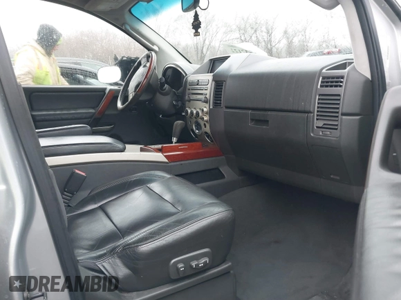 2006 Infiniti QX56 with VIN 5N3AA08C56N810383, listed as a IAAI auction lot 41537122 with 213,814 mi miles. Bid and sale history available at carsss.com. Image 5.