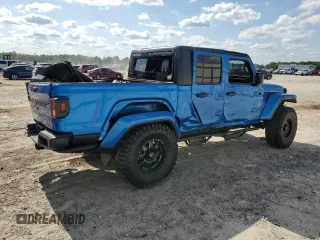 2020 Jeep Gladiator Overland z VIN 1C6HJTFG4LL162262, wystawiony jako Copart lot #57261325 z przebiegiem 74 856 mil mil oraz Szkoda całkowita • Salvage title. Historia ofert i sprzedaży dostępna na DreamBid. Obrazek 3.