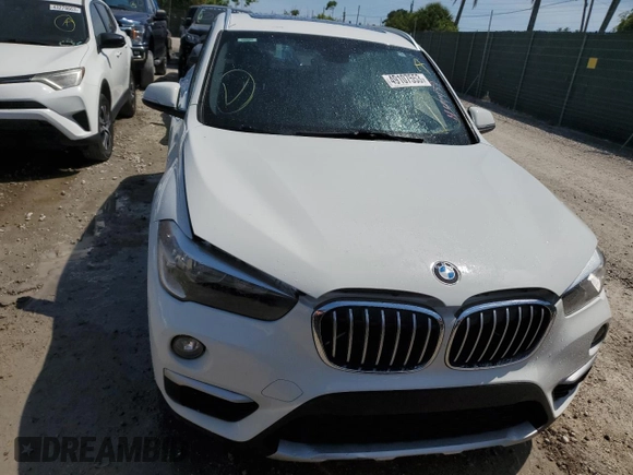 2018 BMW X1 sDrive28i with VIN WBXHU7C38J5H44459, listed as a Copart auction lot 49107553 with 96,494 mi miles and . Bid and sale history available at DreamBid. Image 5.