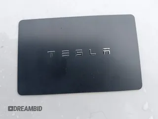 2018 Tesla Model 3 Long Range Battery with VIN 5YJ3E1EA3JF013253, listed as a IAAI auction lot 41752102 with 84,459 mi miles. Bid and sale history available at carsss.com. Image 11.