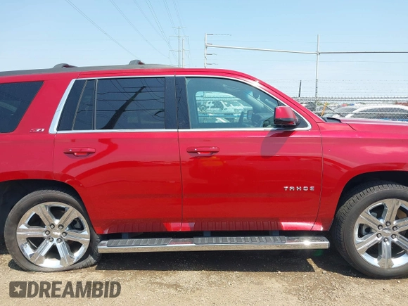 2015 Chevrolet Tahoe LT with VIN 1GNSKBKC6FR628355, listed as a IAAI auction lot 42159743 with 95,730 mi miles and . Bid and sale history available at DreamBid. Image 13.