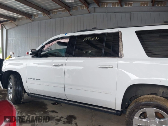 2019 Chevrolet Suburban Premier with VIN 1GNSKJKJ2KR354283, listed as a IAAI auction lot 39548082 with Not Provided miles and . Bid and sale history available at DreamBid. Image 14.