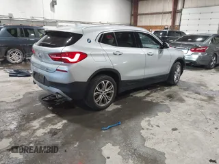 2020 BMW X2 xDrive28i with VIN WBXYJ1C09L5P35894, listed as a IAAI auction lot 41588426 with 24,476 mi miles. Bid and sale history available at carsss.com. Image 4.