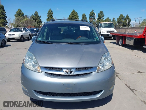 2006 Toyota Sienna XLE with VIN 5TDZA22CX6S555163, listed as a IAAI auction lot 41936624 with 230,825 mi miles. Bid and sale history available at carsss.com. Image 6.