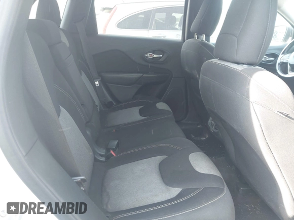 2016 Jeep Cherokee Altitude with VIN 1C4PJLABXGW323881, listed as a IAAI auction lot 42289189 with 147,631 mi miles and . Bid and sale history available at DreamBid. Image 8.