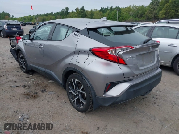 2018 Toyota C-HR XLE with VIN NMTKHMBX7JR014817, listed as a IAAI auction lot 42254183 with 128,561 mi miles and . Bid and sale history available at DreamBid. Image 3.