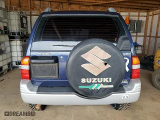 2000 Suzuki Grand Vitara JLX with VIN JS3TD62VXY4110167, listed as a Copart auction lot 77887674 with 126,214 mi miles and Salvage Title. Bid and sale history available at carsss.com. Image 6.