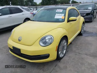 2013 Volkswagen Beetle 2.5L with VIN 3VWHX7AT7DM604449, listed as a IAAI auction lot 42406666 with 104,874 mi miles and . Bid and sale history available at DreamBid. Image 2.