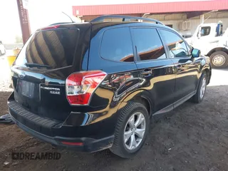 2015 Subaru Forester 2.5i Premium with VIN JF2SJADC8FG804998, listed as a IAAI auction lot 41885715 with 70,636 mi miles. Bid and sale history available at carsss.com. Image 4.