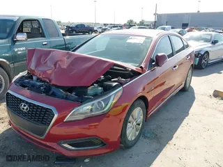 2016 Hyundai Sonata Hybrid SE with VIN KMHE24L19GA016239, listed as a IAAI auction lot 40813246 with 118,031 mi miles. Bid and sale history available at carsss.com. Image 2.