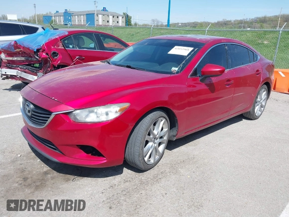 2015 Mazda 6 i Touring with VIN JM1GJ1V58F1185486, listed as a IAAI auction lot 42053968 with 239,811 mi miles and . Bid and sale history available at carsss.com. Image 2.