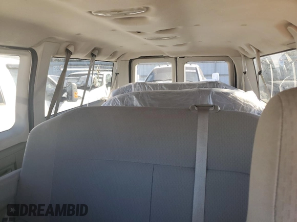 2009 Ford Econoline Passenger XL с VIN 1FBNE31L69DA77094, выставлен на аукционе Copart как лот 44905115 с пробегом 186 403 миль миль и Списание • Salvage title. История ставок и продаж доступна на DreamBid. Изображение 10.