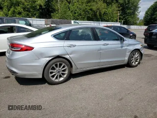 2017 Ford Fusion SE with VIN 3FA6P0HD4HR187841, listed as a Copart auction lot 61766415 with 74,303 mi miles and Salvage title. Bid and sale history available at DreamBid. Image 3.