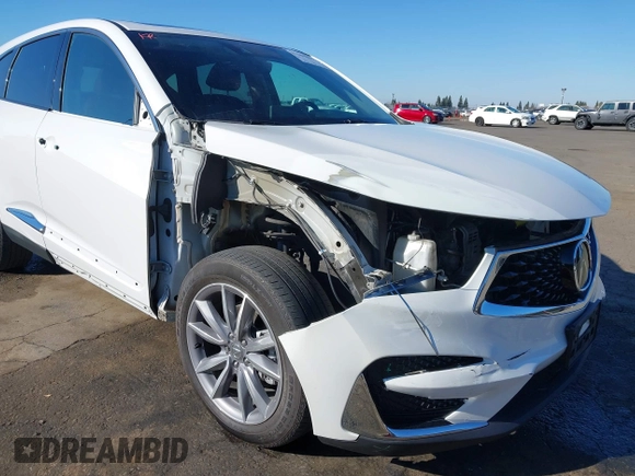 2021 Acura RDX w/Technology Package with VIN 5J8TC2H5XML037658, listed as a IAAI auction lot 41209895 with 85,011 mi miles. Bid and sale history available at carsss.com. Image 6.