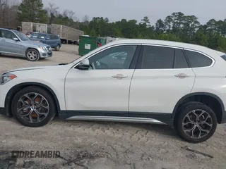 2022 BMW X1 xDrive28i z VIN WBXJG9C0XN5U89973, wystawiony jako IAAI lot #41508343 z przebiegiem 67 424 mil mil oraz . Historia ofert i sprzedaży dostępna na DreamBid. Obrazek 14.