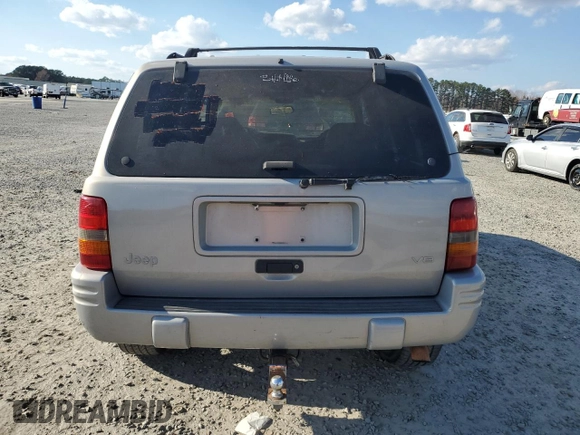 1998 Jeep Grand Cherokee with VIN 1J4GX48Y7WC216585, listed as a Copart auction lot 83532184 with 144,739 mi miles and Salvage title. Bid and sale history available at DreamBid. Image 6.