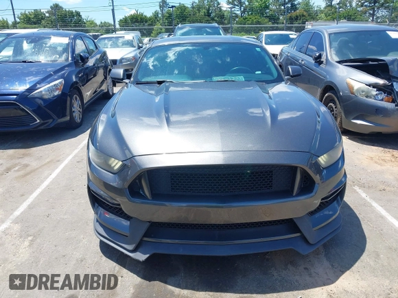 2015 Ford Mustang EcoBoost z VIN 1FA6P8TH5F5351476, wystawiony jako IAAI lot #42157688 z przebiegiem 134 131 mil mil oraz . Historia ofert i sprzedaży dostępna na DreamBid. Obrazek 13.